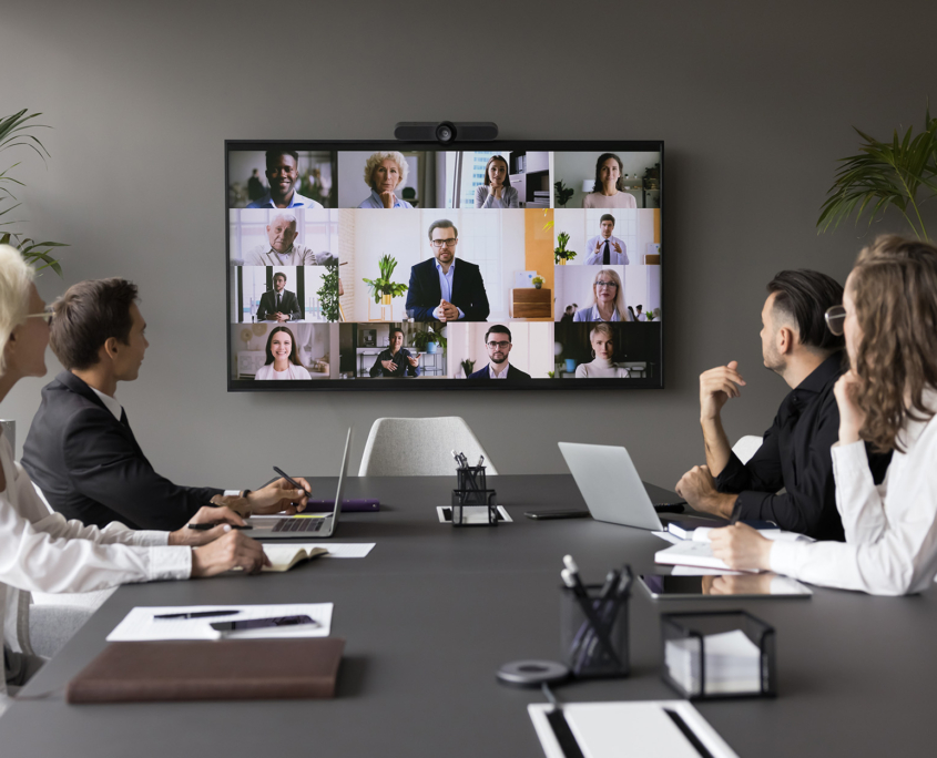 Front view of a business teleconferencing meeting