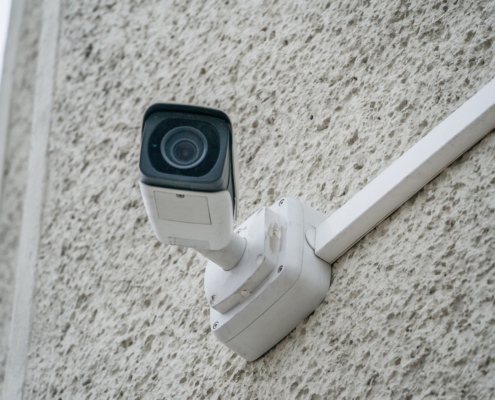 Video camera security system on the wall of the building