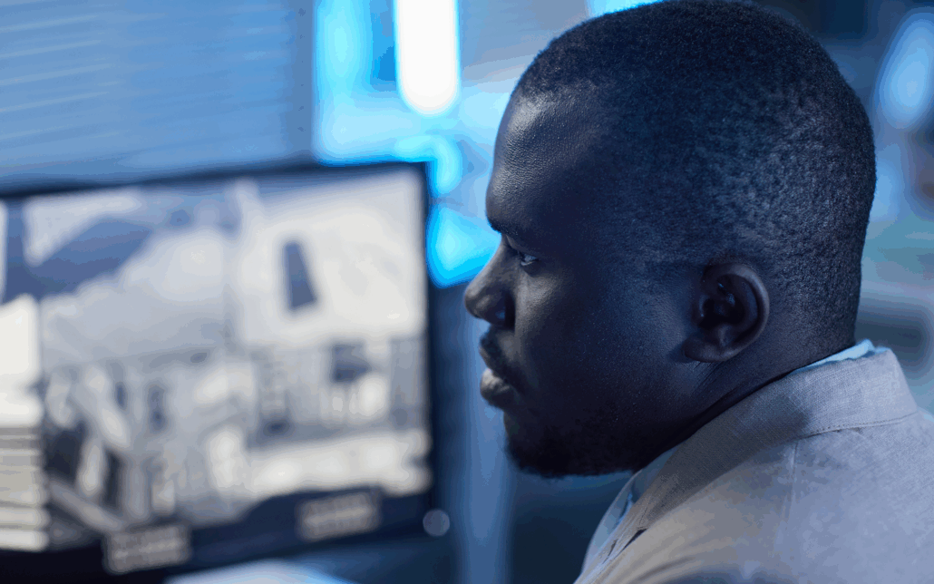 person looking at camera feed