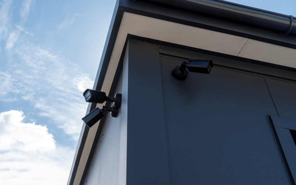 Security camera on modern metal building