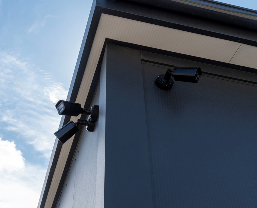 Security camera on modern metal building Security camera on modern metal building