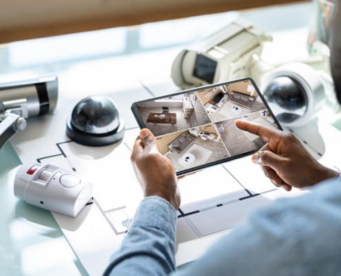 Worker looking at surveillance systems
